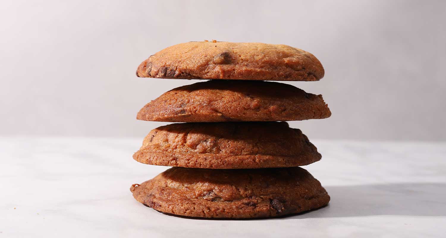Chocolate chip cookies stacked on top of each other
