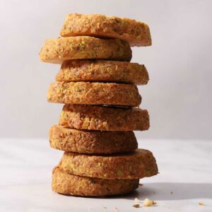 large stack of pistachio shortbread cookies